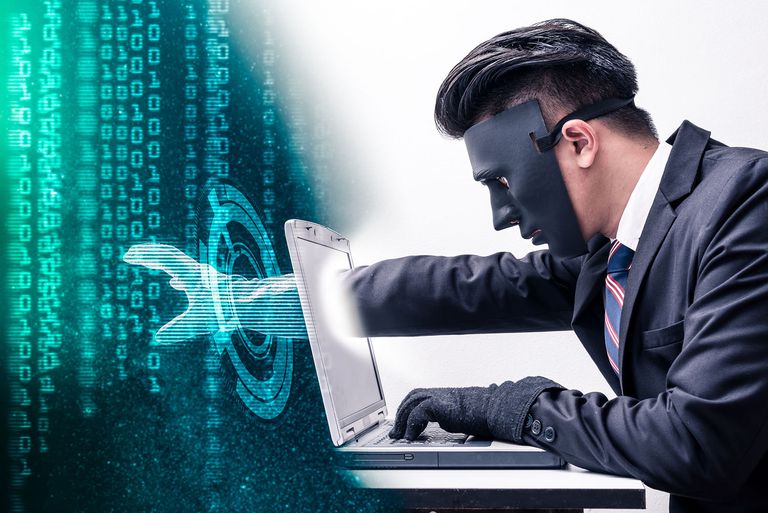 hacker using a laptop